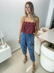 BELTED SLEEVELESS BLOUSE