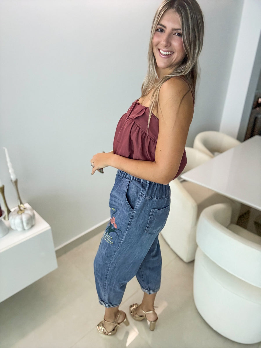 BELTED SLEEVELESS BLOUSE