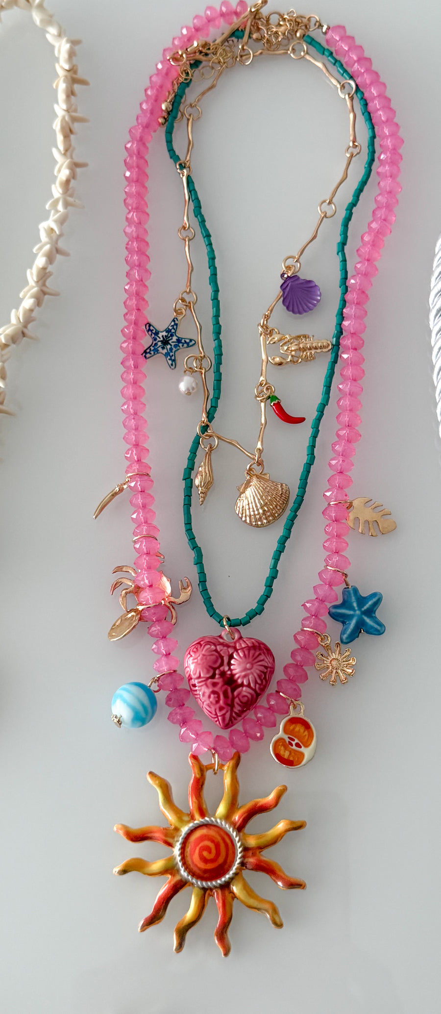 SUN LAYERED NECKLACES