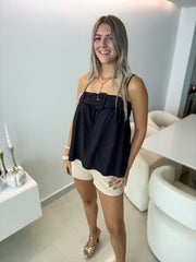BELTED SLEEVELESS BLOUSE