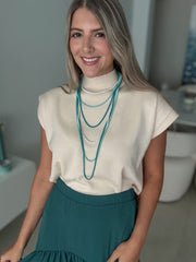 BEIGE MOCK NECK KNITTED BLOUSE