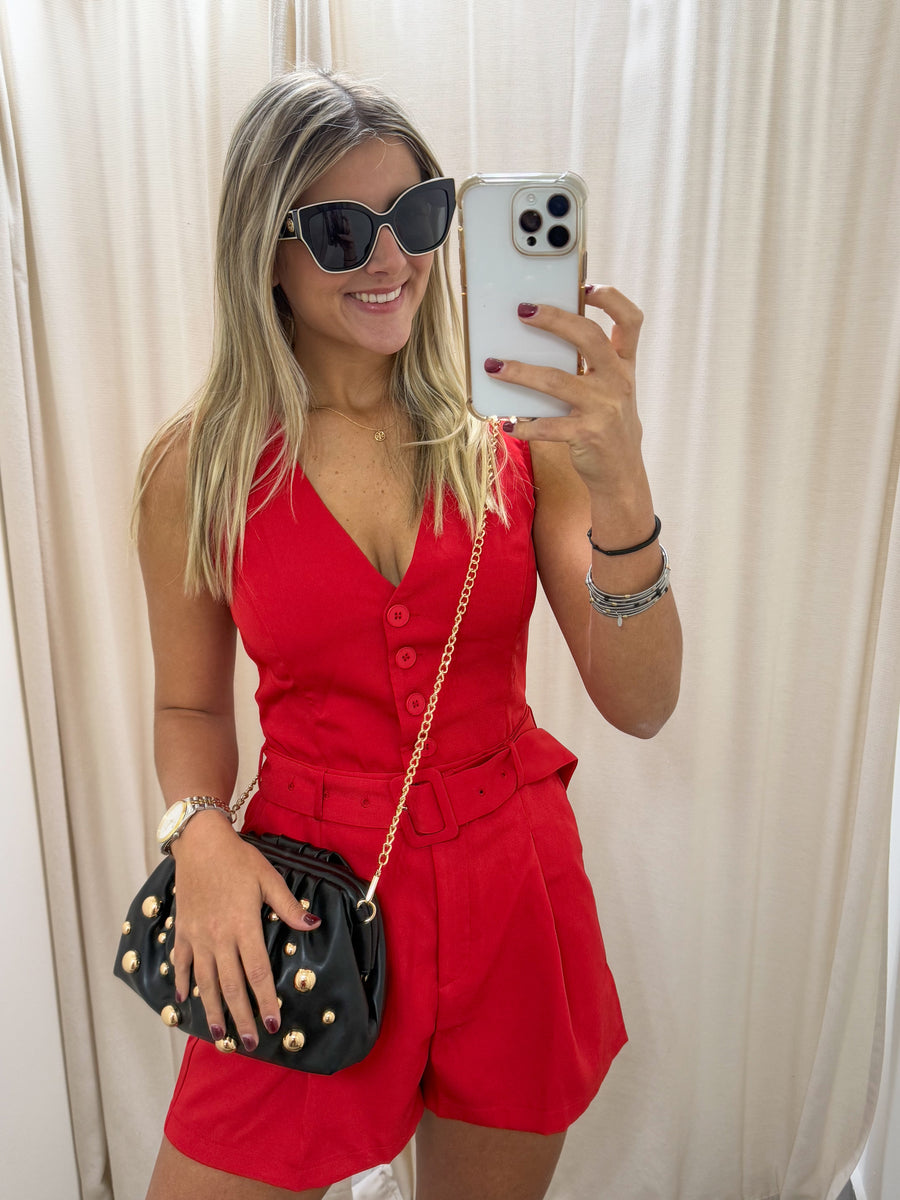 RED SLEEVELESS V-NECK ROMPER