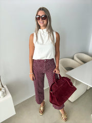 BURGUNDY POLKA DOT JEANS
