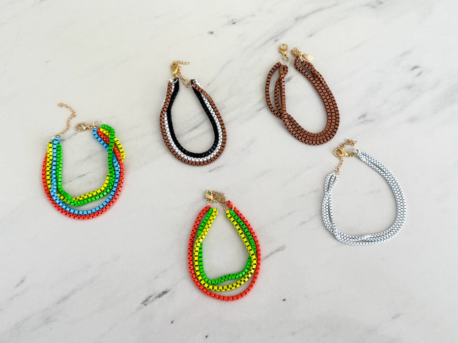 LAYERED BRACELETS