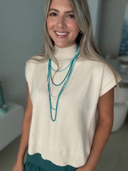 BEIGE MOCK NECK KNITTED BLOUSE
