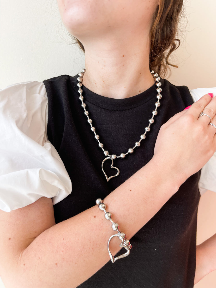 SILVER TWISTED HEART NECKLACE
